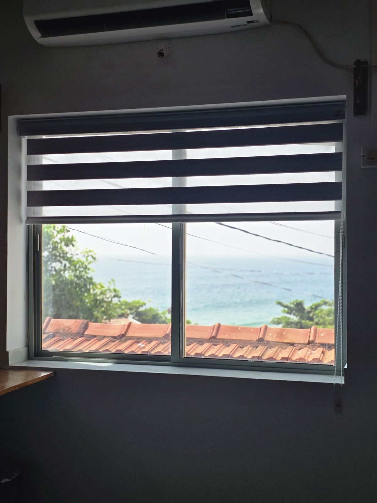 Window seat looking out at the sea